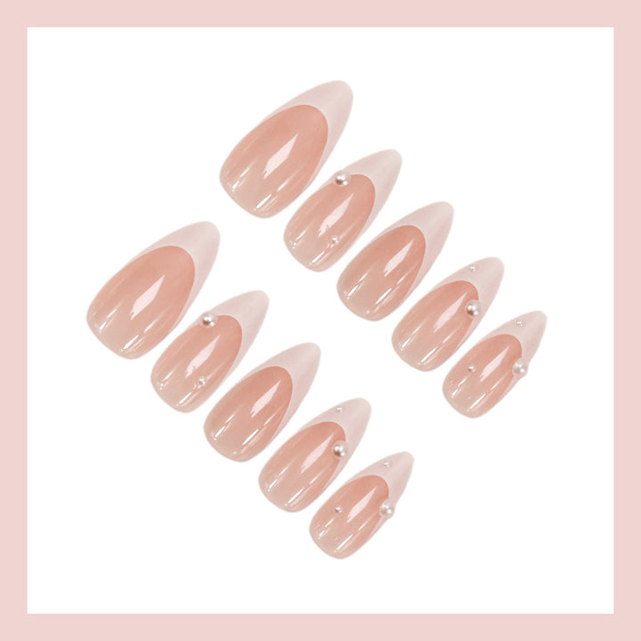 Artificial nail set with elegant French tip and shimmering pearl accents Kalsten