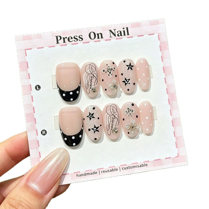Artistic Press-On Nail Set with Star and Floral Accents