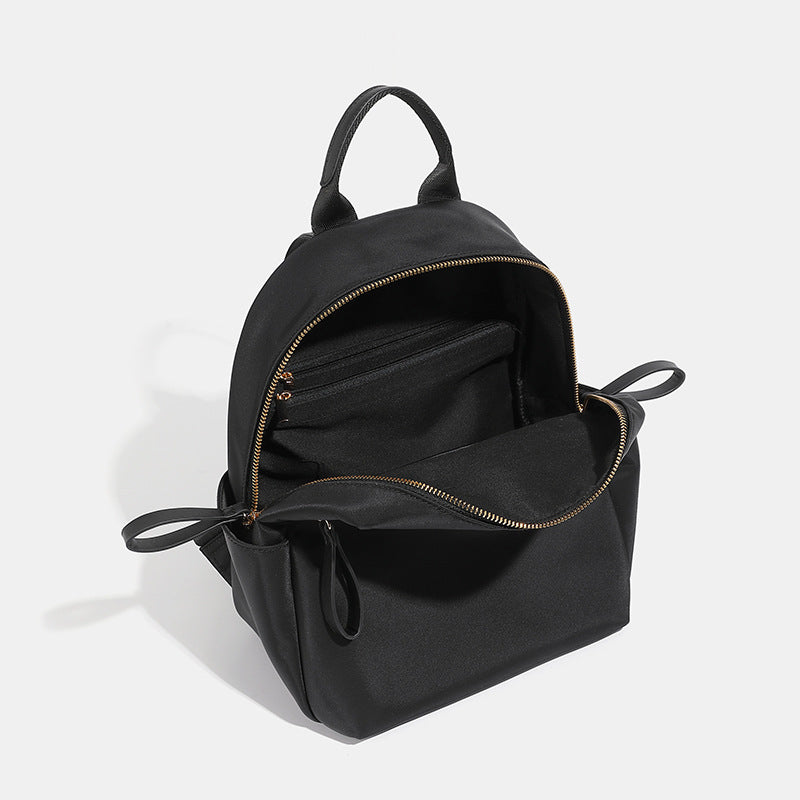 Compact Nylon Backpack with Multiple Pockets