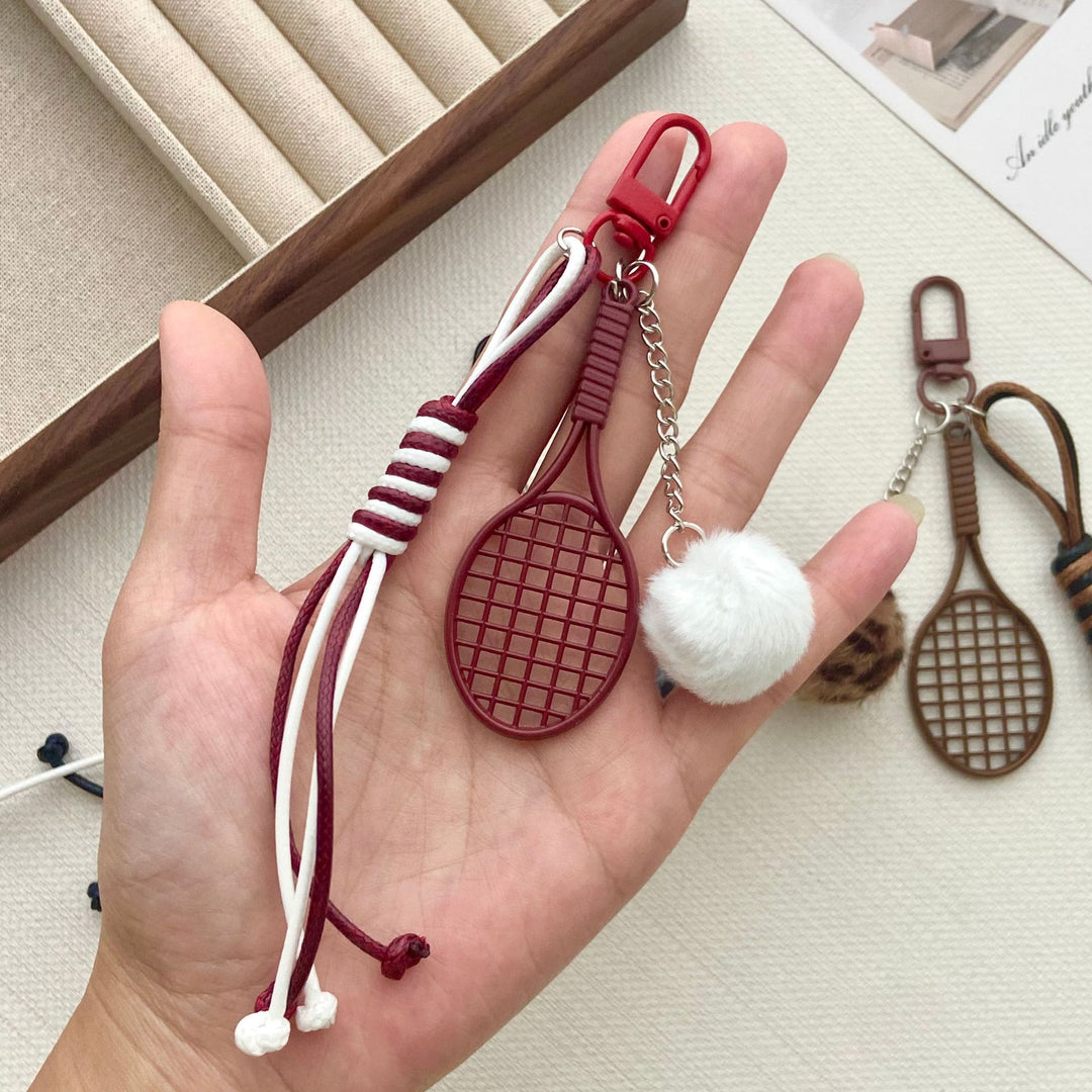 Tennis Racket and Fur Ball Keychain Kalsten