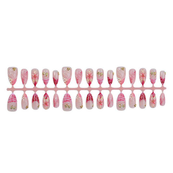 Creative nail art set with romantic flower pattern and sparkling accents Kalsten
