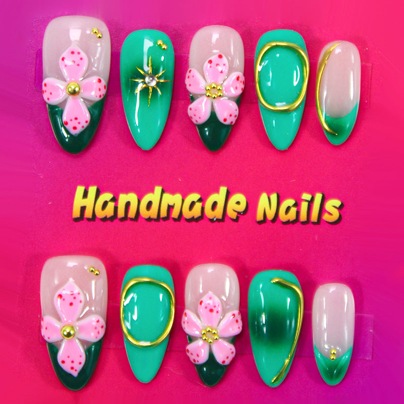 Artificial nails with floral accents and glitter decorations Kalsten
