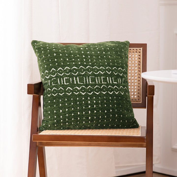 Decorative cushion cover with woven jacquard structure and ethnic motif