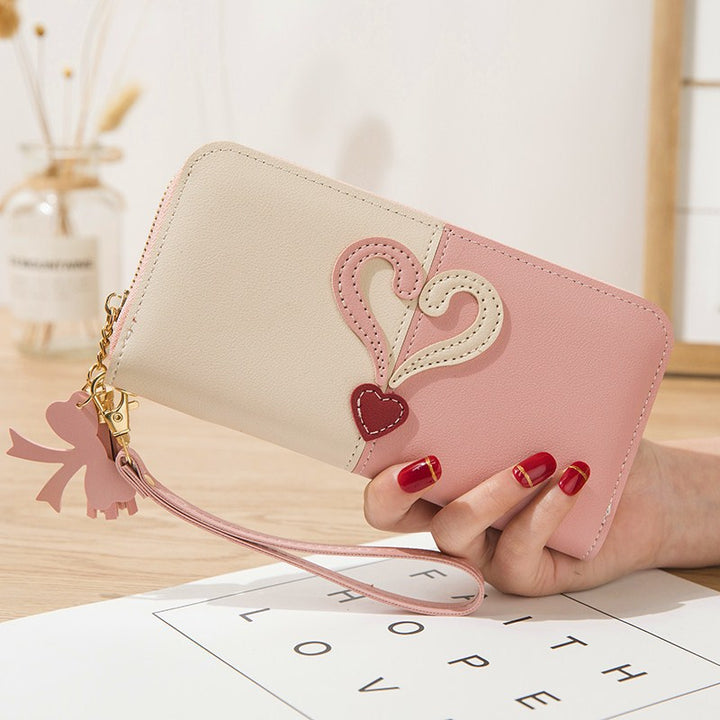 Stylish wallet with heart appliqués Kalsten