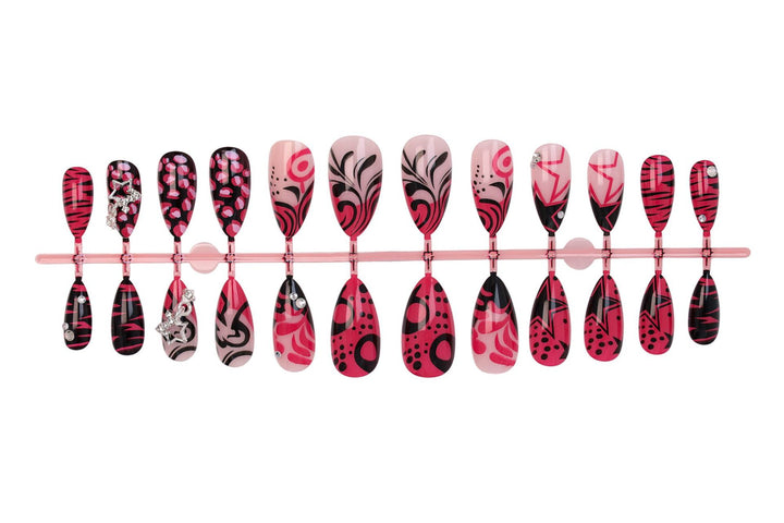 Nail art set with playful patterns and rhinestone embellishments Kalsten
