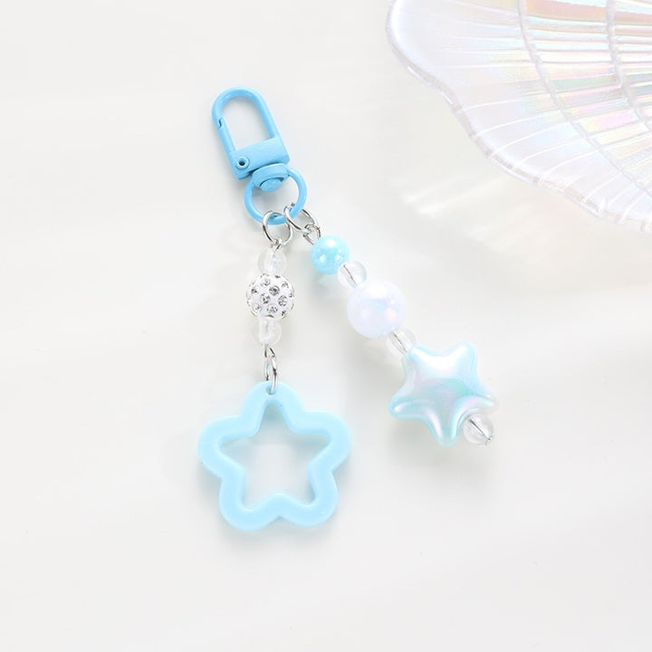 Playful keychain with floral and star motif Kalsten
