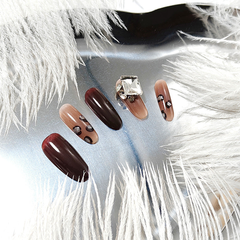 Luxury artificial nails with elegant rhinestone applications Kalsten
