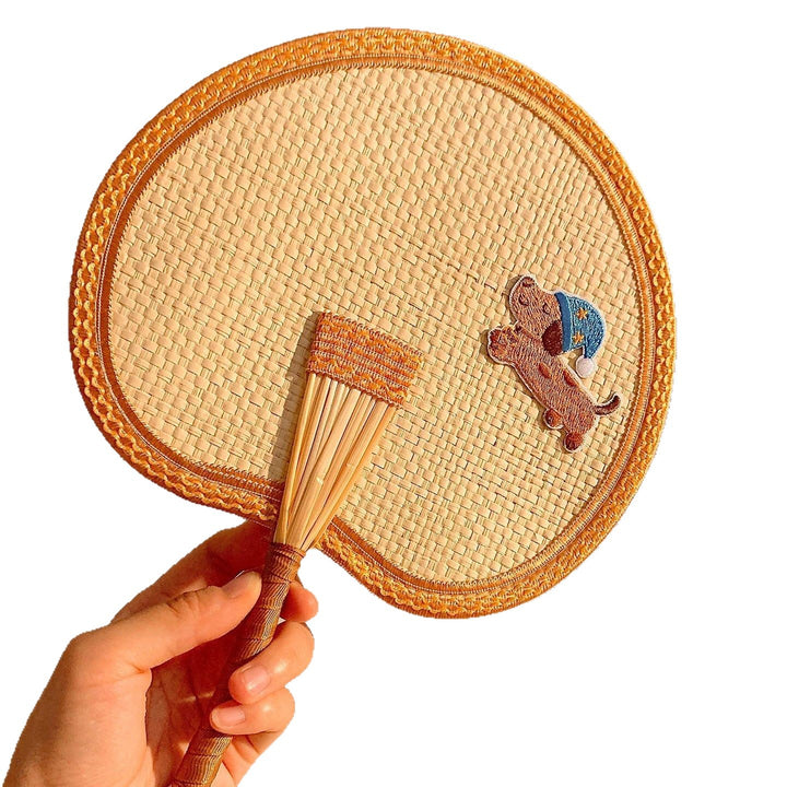 Handcrafted fan with playful dog motif Kalsten