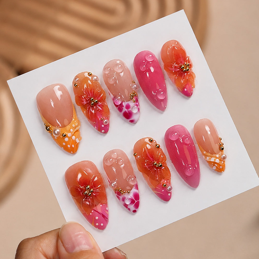 Artificial nail set with floral designs and elegant embellishments Kalsten