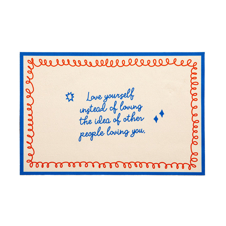 rectangular door mat made of canvas with typographic lettering