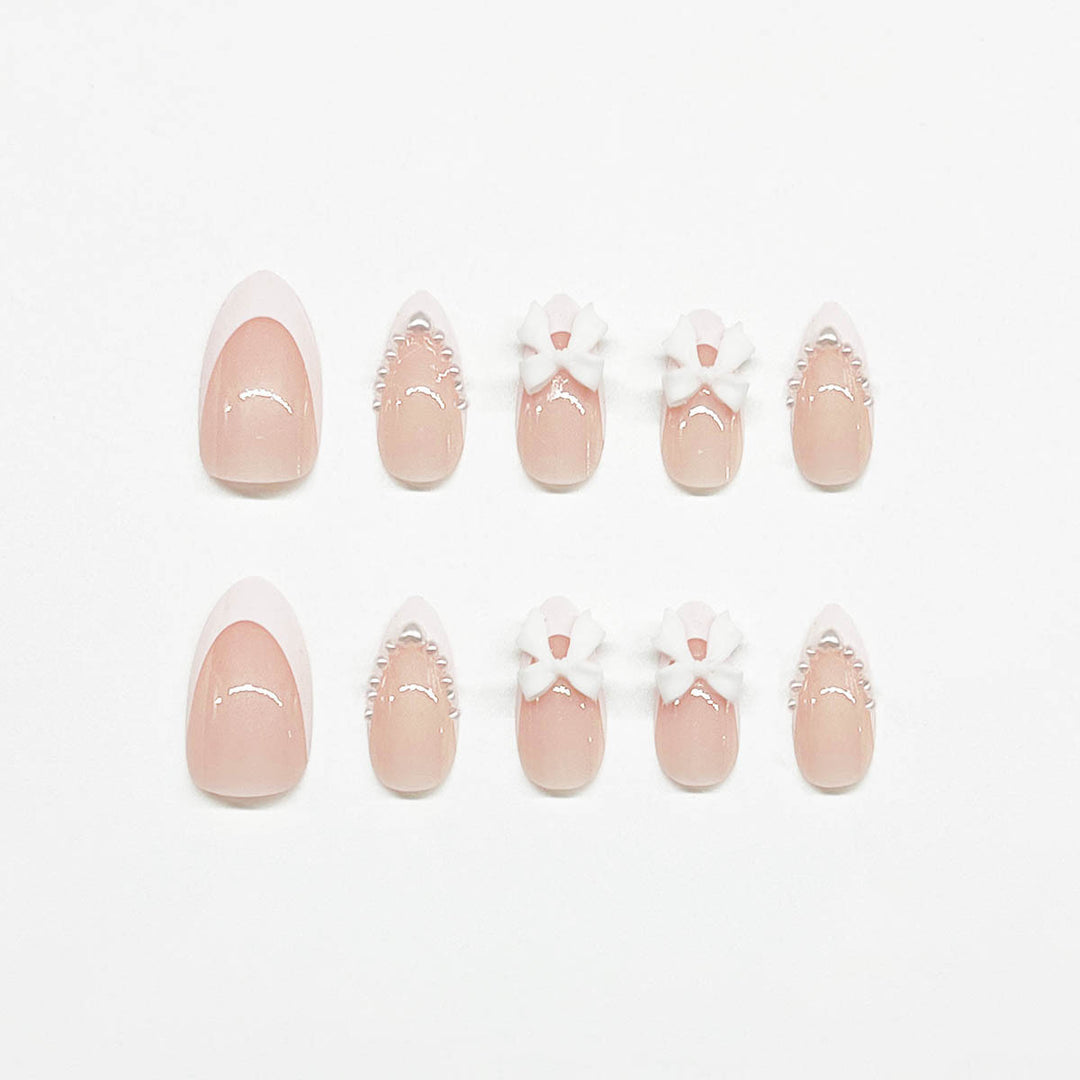 Elegant Bow-Embellished Acrylic Nail Enhancements Kalsten