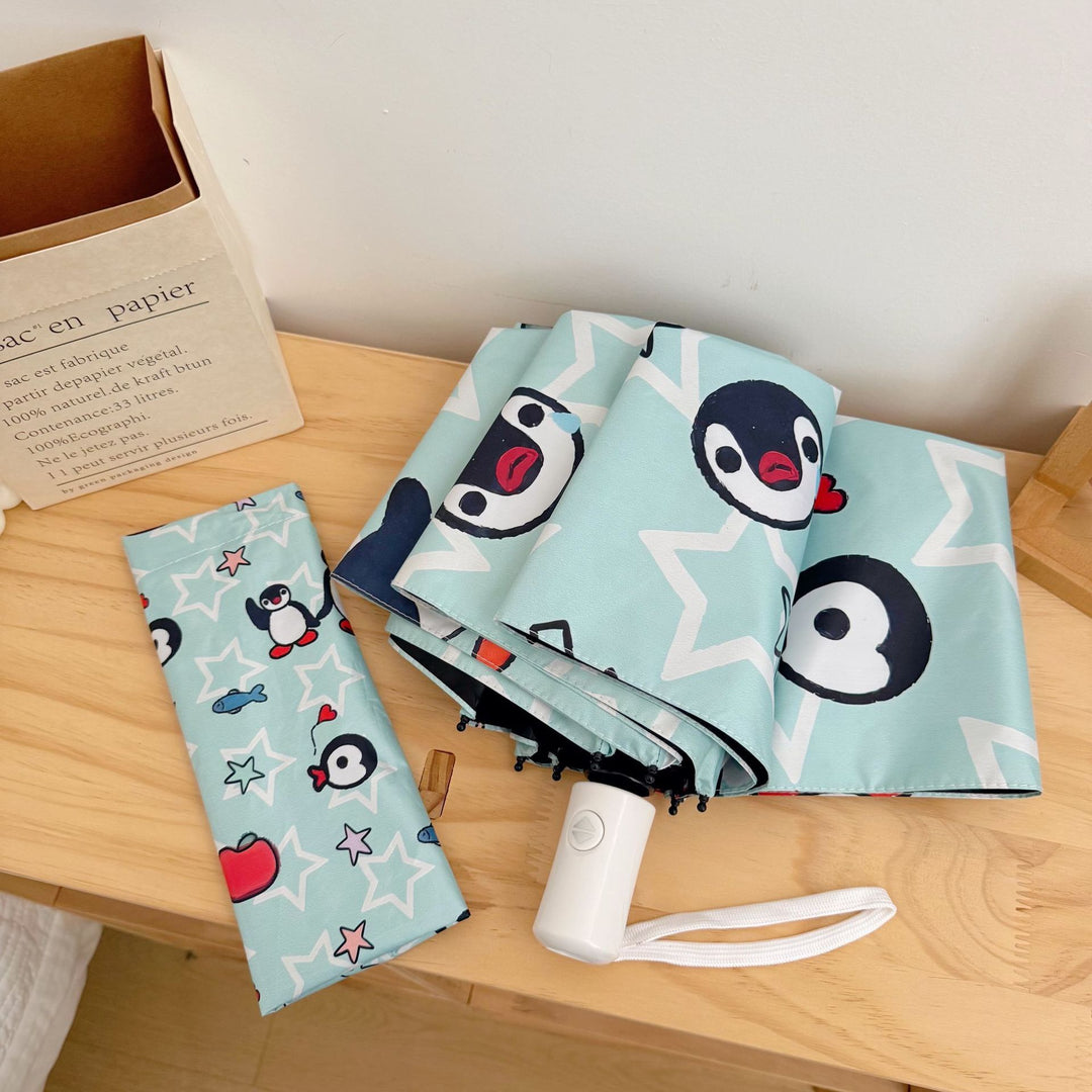 Ladies collapsible umbrella with playful penguin design Kalsten