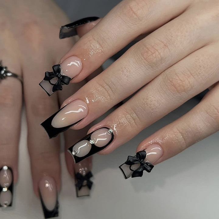 Elegant Stiletto Nail Art Extensions with Bow Accents Kalsten