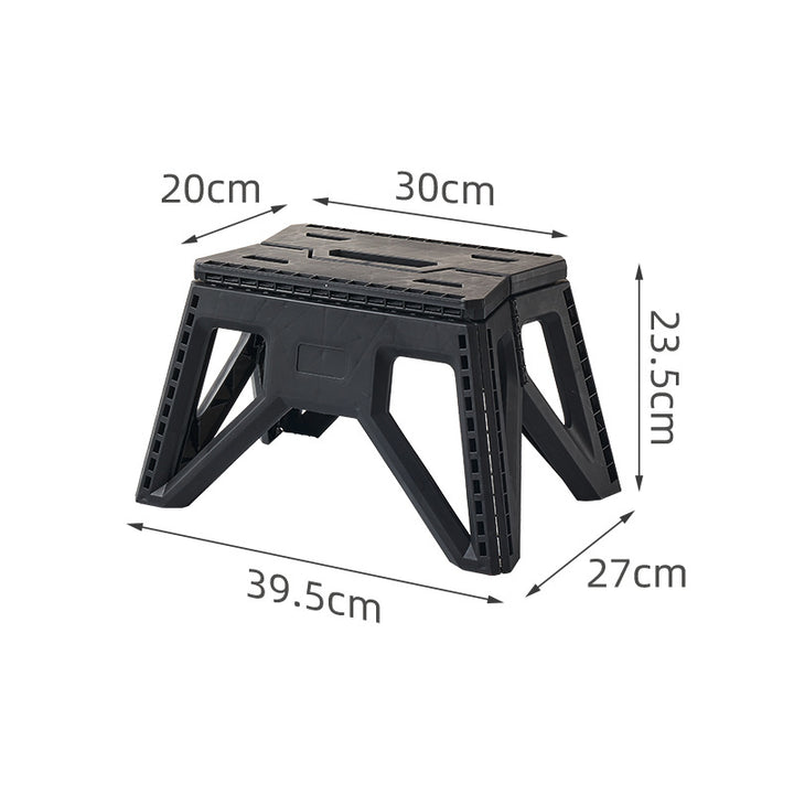 Compact foldable step stool made of shatterproof plastic with carrying handle and non-slip feet