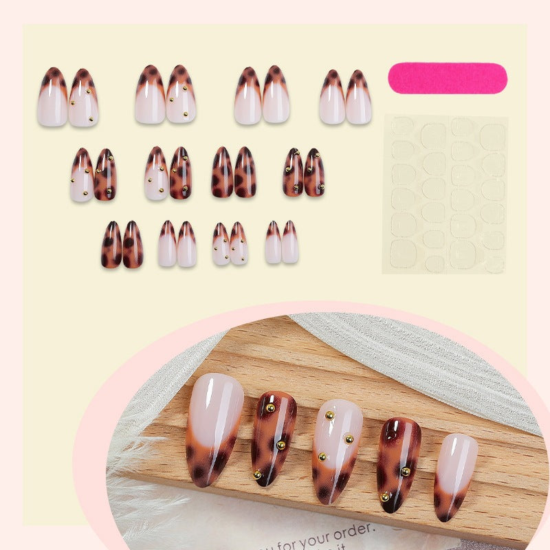 Artificial nail collection with elegant leopard design and glitter accents Kalsten