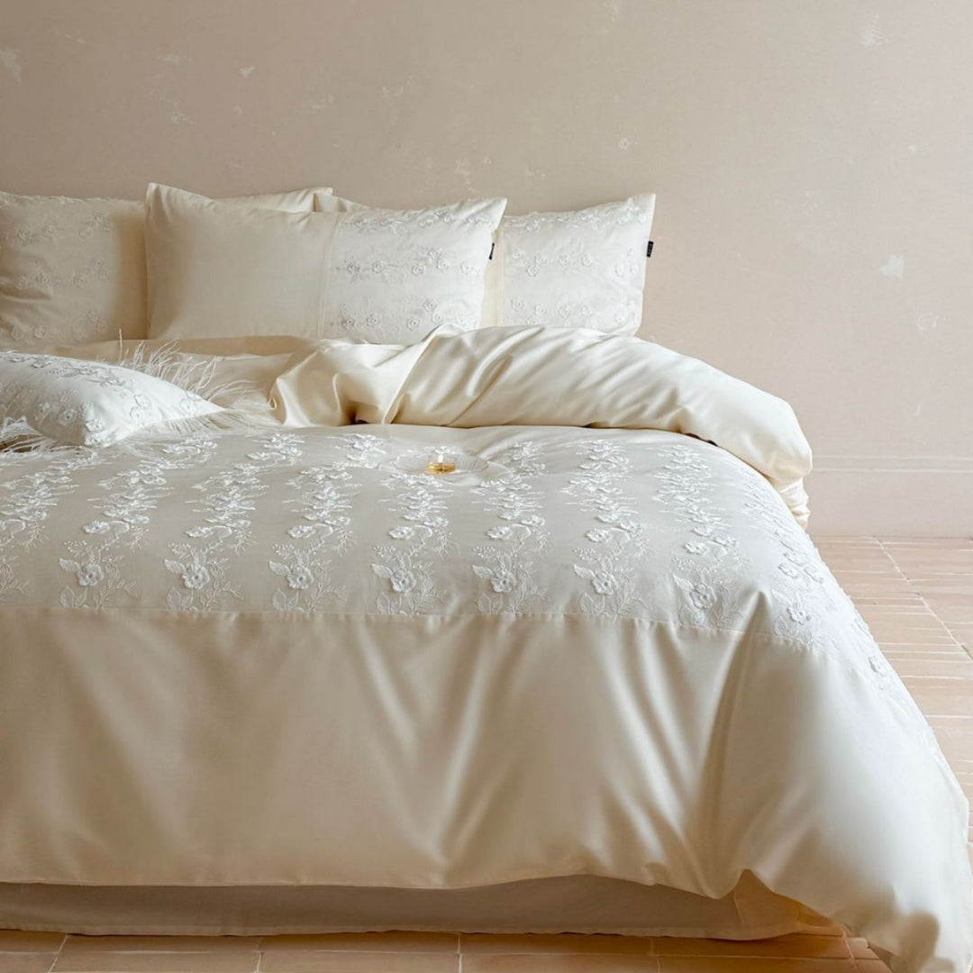 Luxurious satin bedding set with floral embroidery and pillowcases