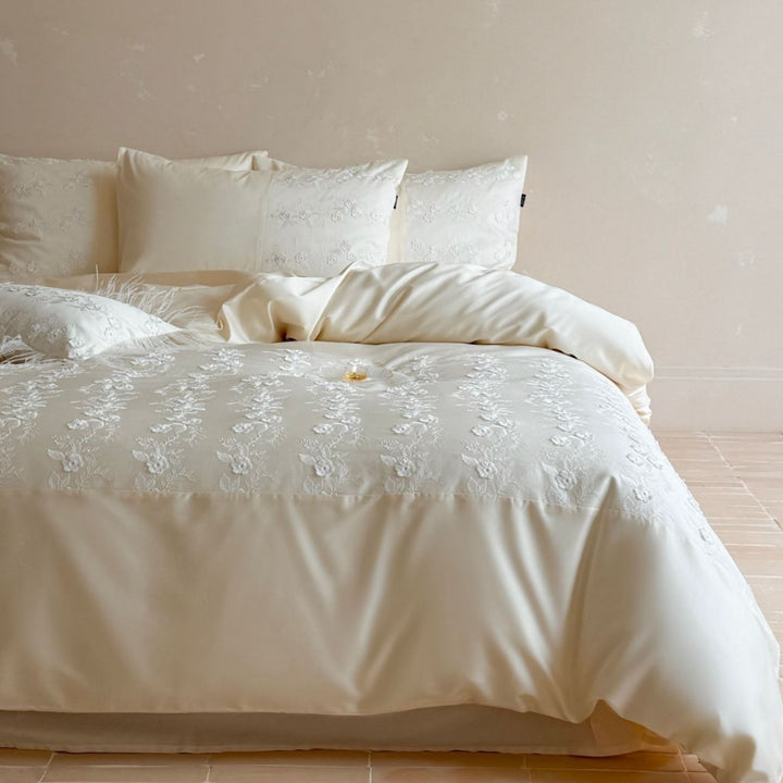 Luxurious satin bedding set with floral embroidery and pillowcases