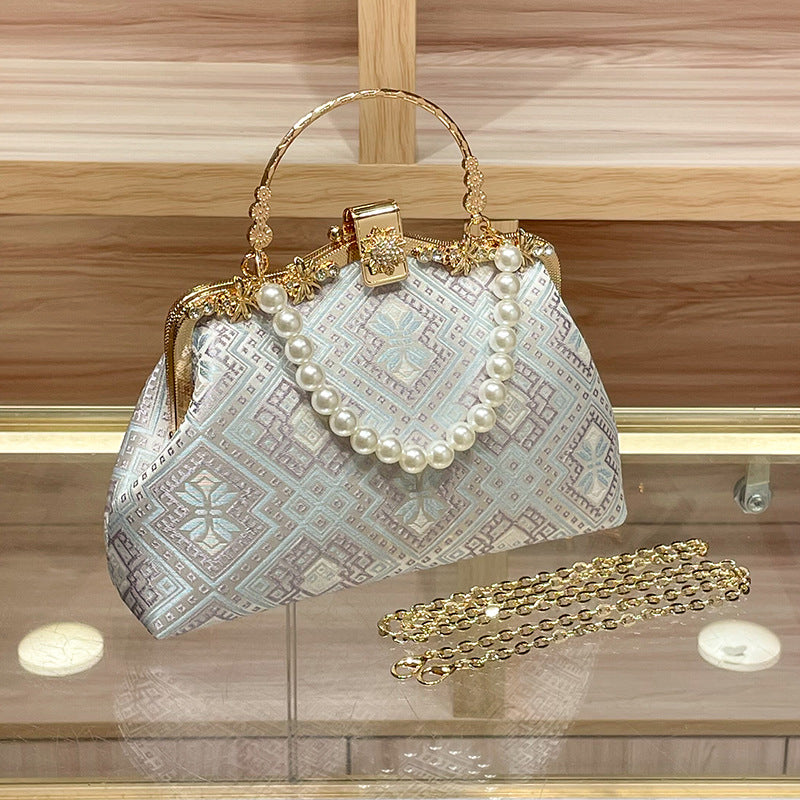 Elegant Pearl-Embellished Handbag