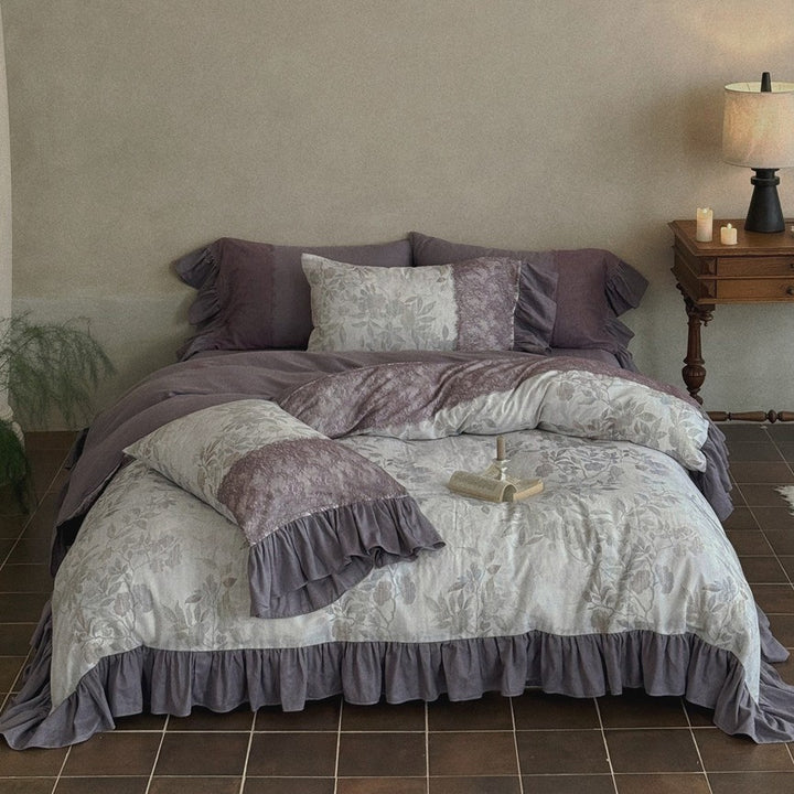 Bedding set with jacquard panels, ruffled bed skirt and reversible pillow