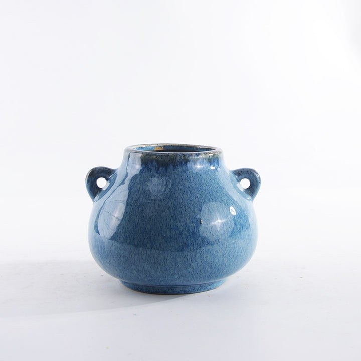 Decorative ceramic pot with playful handles Kalsten
