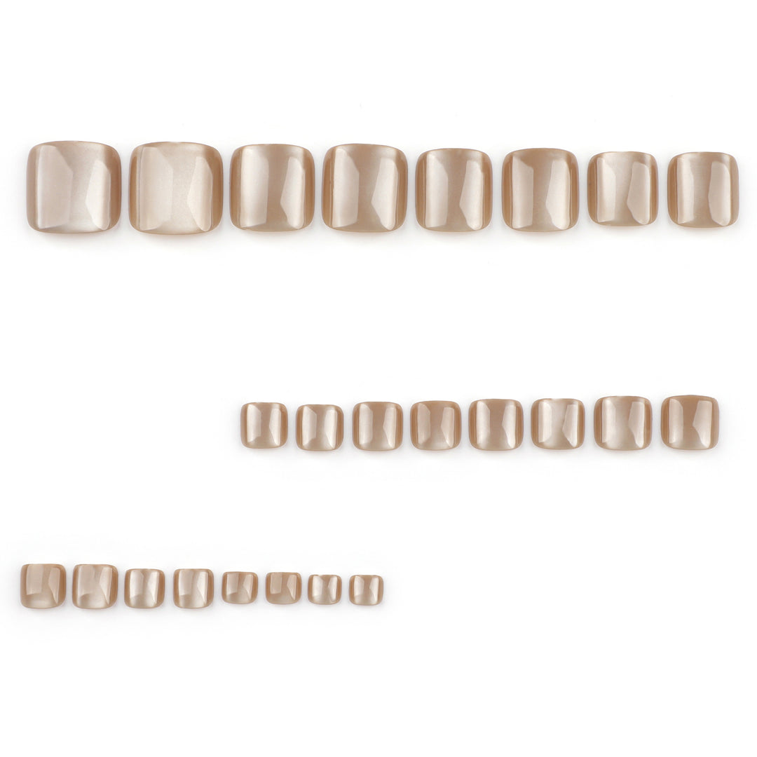 Artful nail art with glitter accents and soft ombre effect Kalsten
