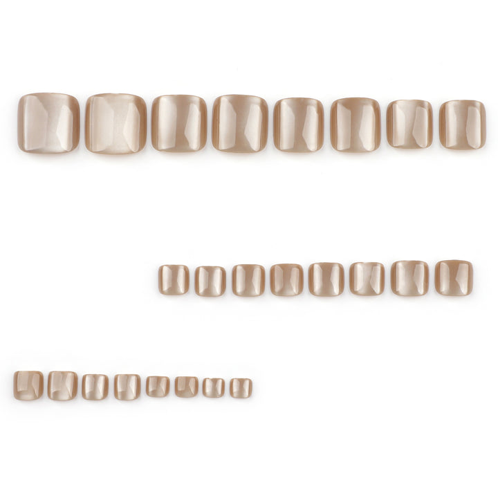 Artful nail art with glitter accents and soft ombre effect Kalsten