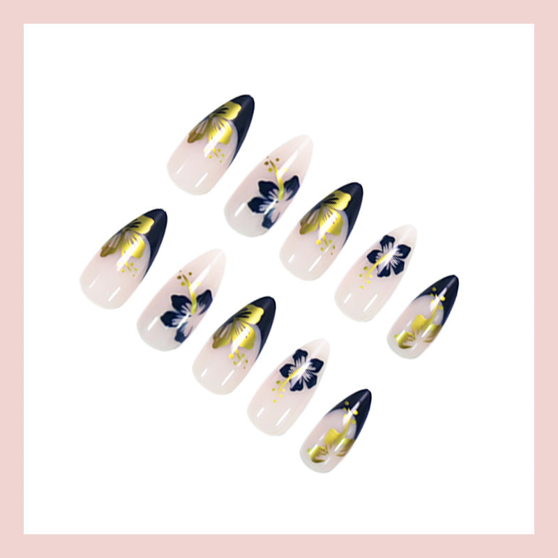 Acrylic nail set with unique flower and gold decorations Kalsten