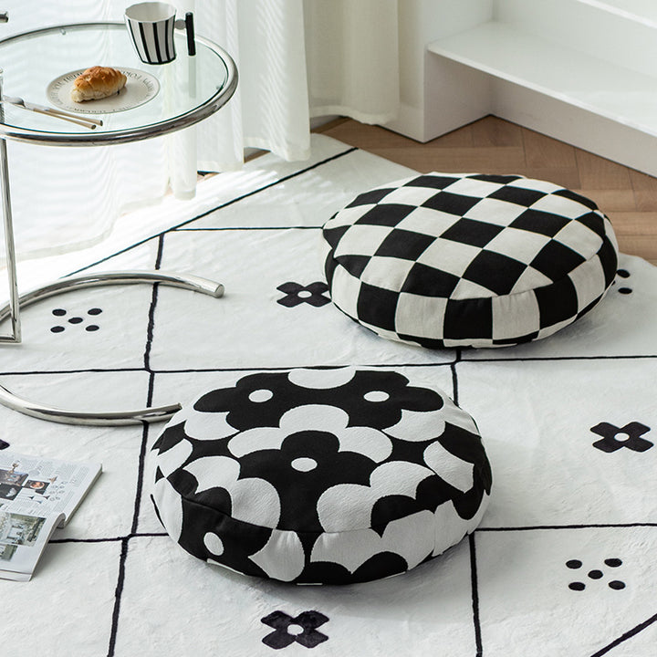 Round decorative seat cushion with floral jacquard structure