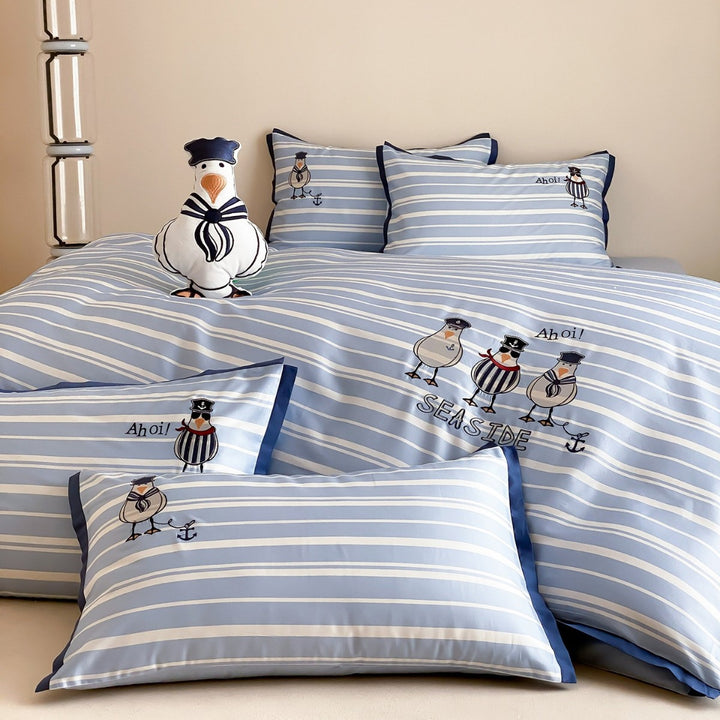Maritime cotton satin bedding set with embroidered seagull motifs and fine stripe pattern
