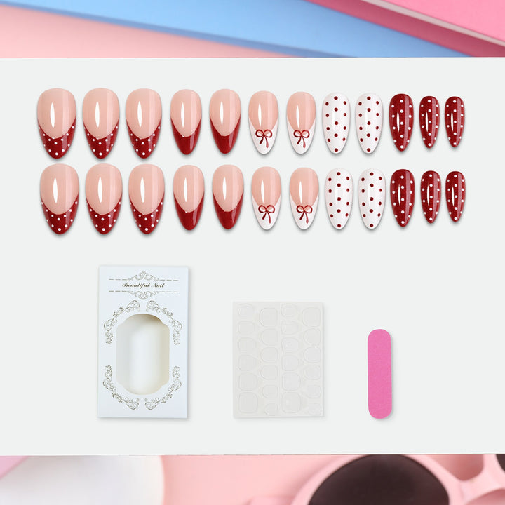 Nail set with elegant bows and polka dots Kalsten
