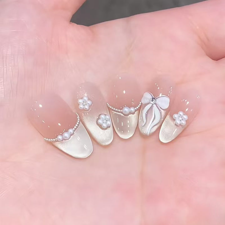 Artistic Press-On Nail Extensions with Floral Embellishments Kalsten
