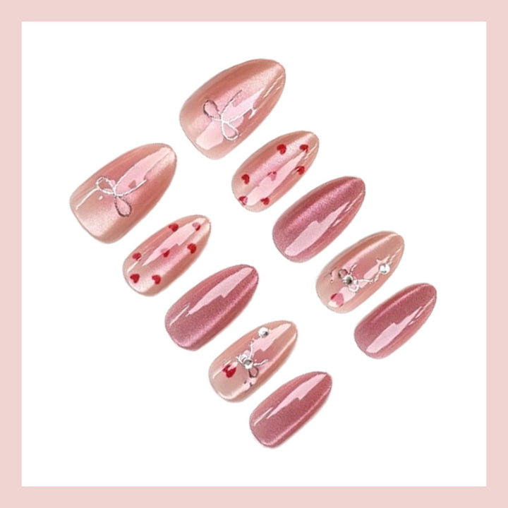 Nail art set with romantic hearts and elegant bows Kalsten