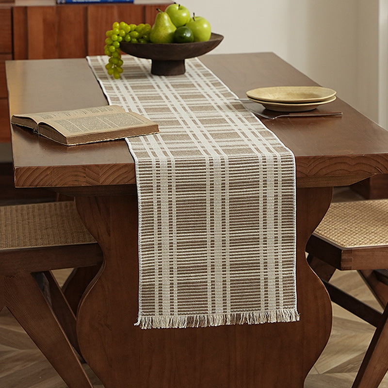 Woven table runner made of cotton blend with textured waffle weave and contrasting center strip Kalsten