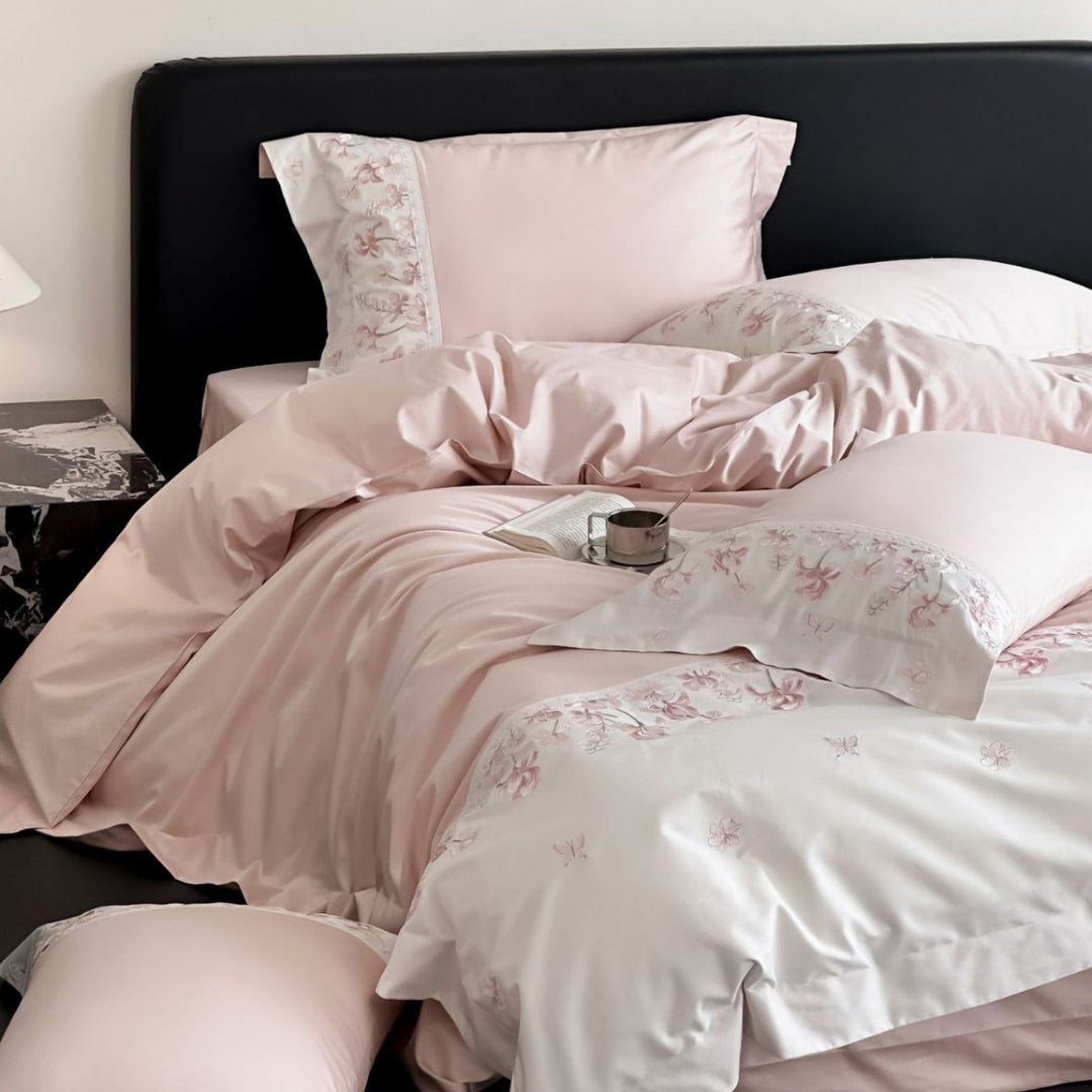 Luxurious satin bedding set with floral stitched border