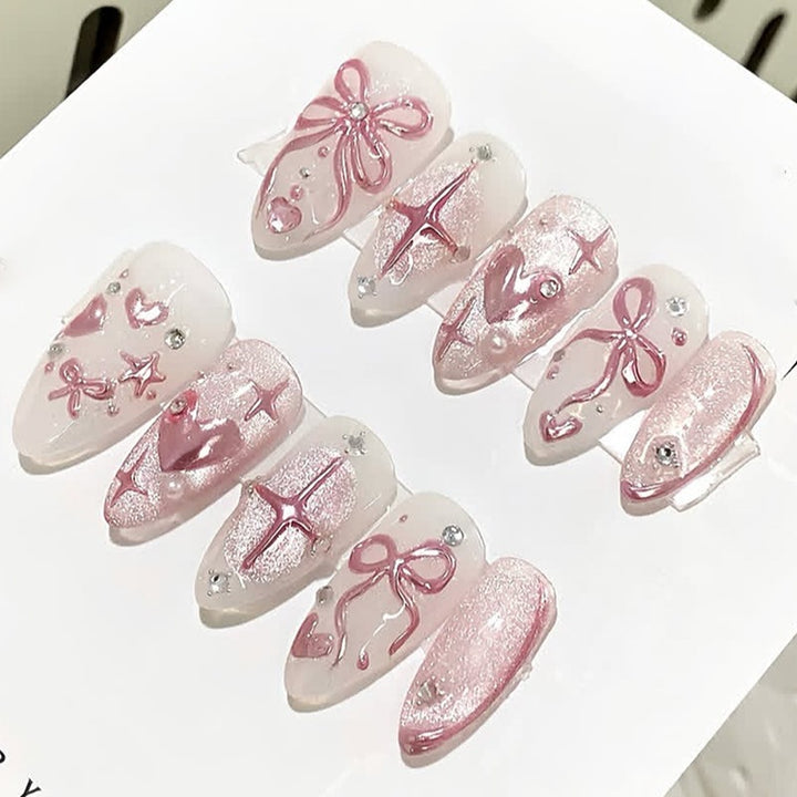 Artificial nail set with glitter and flower accents Kalsten