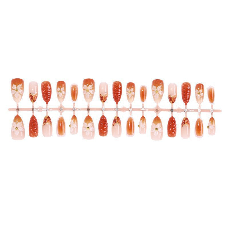 Artificial nail set with handcrafted flowers and elegant embellishments Kalsten