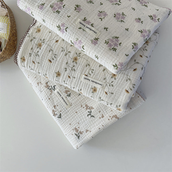 Unisex versatile muslin blanket with floral accents Kalsten