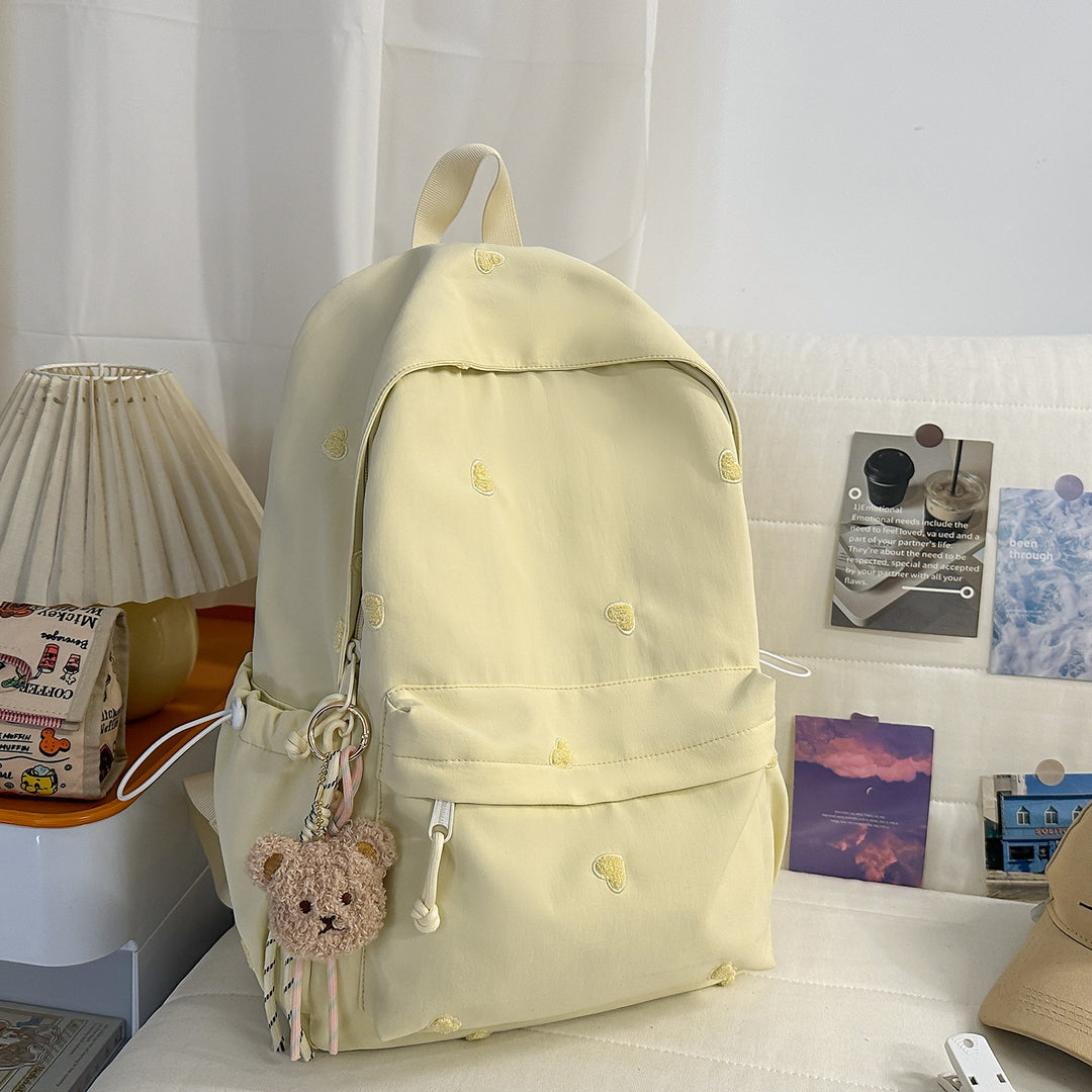 Versatile Casual Backpack with Fun Character Charm Kalsten