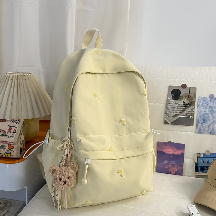 Versatile Casual Backpack with Fun Character Charm Kalsten