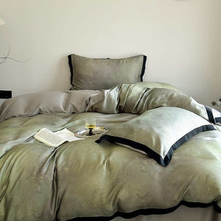 Luxurious satin bedding set with subtle bamboo print and contrasting decorative piping