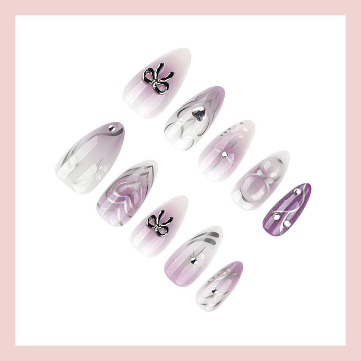 Nail art set with elegant flower and glitter accents Kalsten