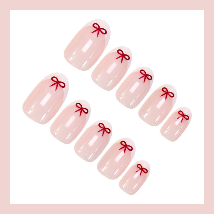 Artificial nail set with romantic bow motifs and French design Kalsten
