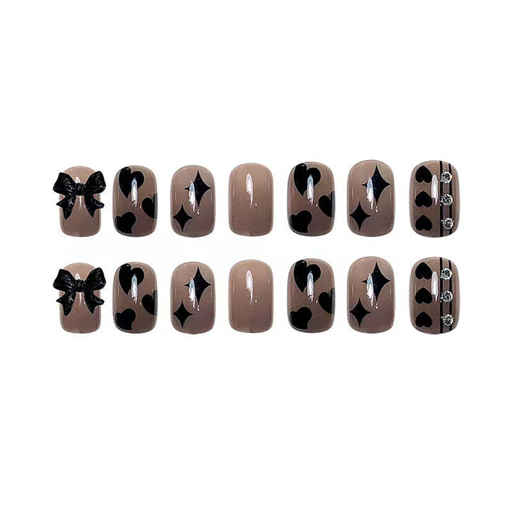 Artificial nails with elegant ribbon and heart designs Kalsten