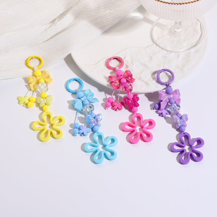 Playful keychain with flower and butterfly details Kalsten