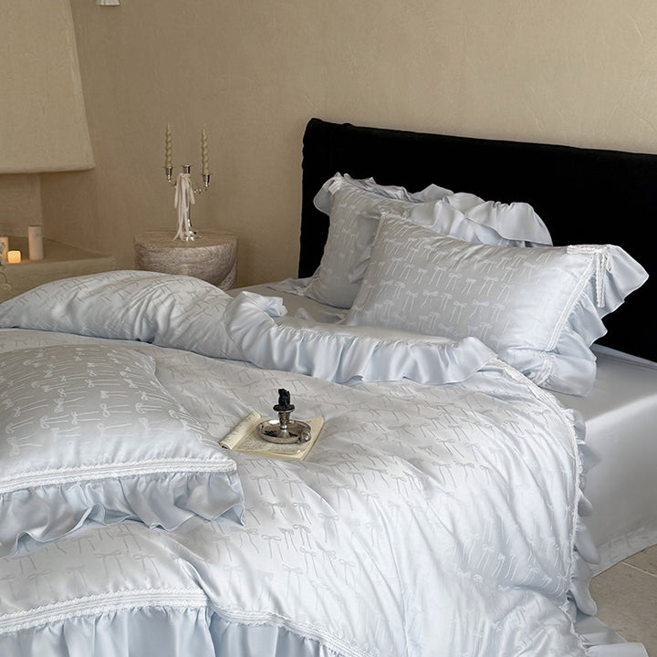 Luxurious satin bedding set with ruffles and fine bow jacquard