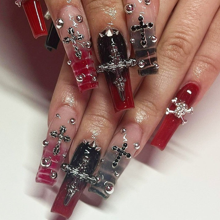 Glamorous artificial nail set with sparkling rhinestones and cross decorations Kalsten
