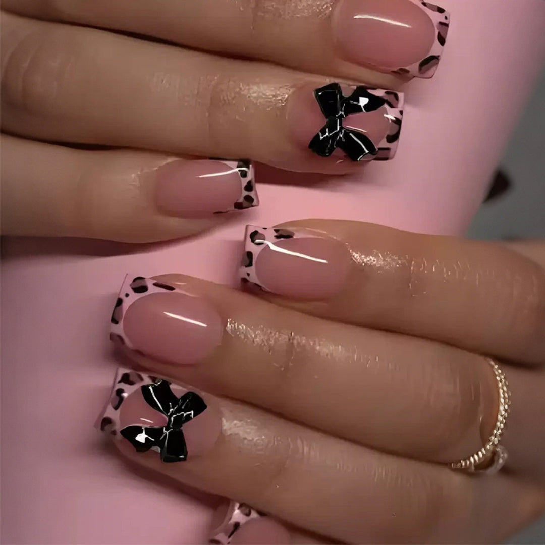 Artificial nail set with glamorous leopard pattern and elegant bows Kalsten