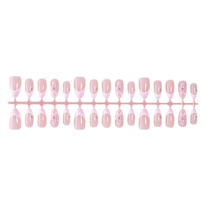 Artificial nail set with romantic flowers and elegant design accents Kalsten