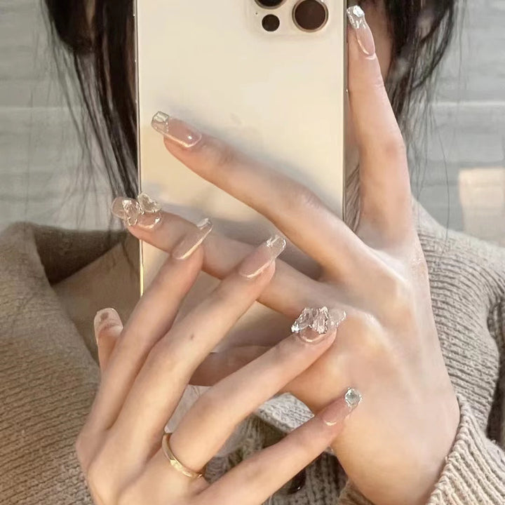 Glamorous artificial nails with delicate rhinestone decorations Kalsten
