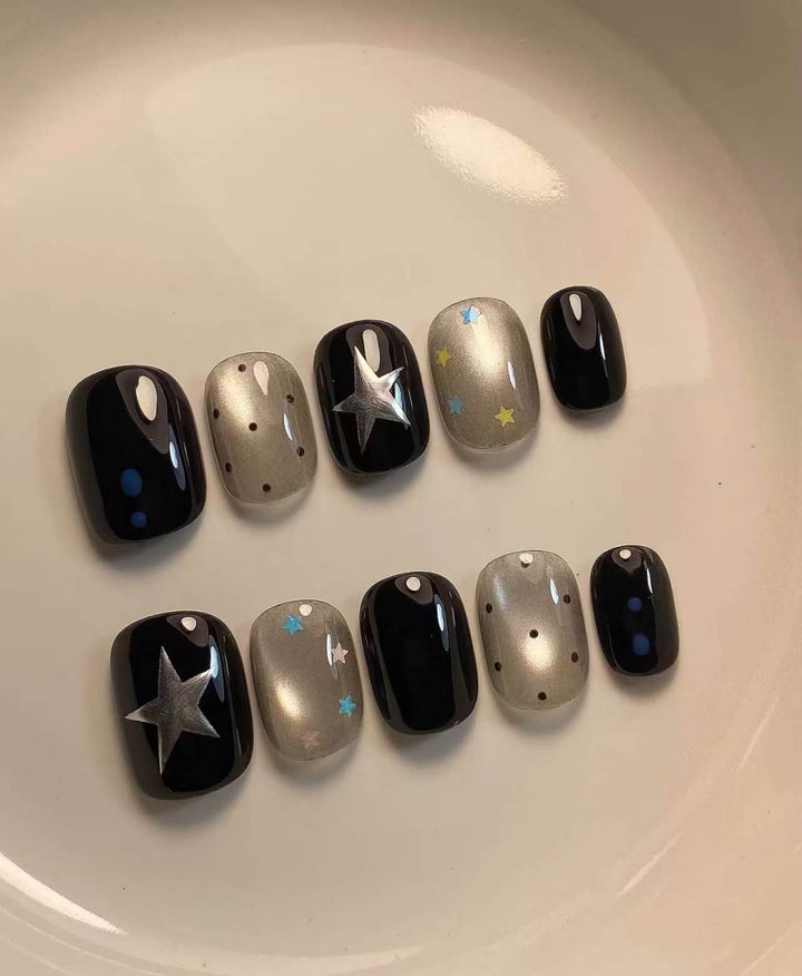 Artistic Press-On Nail Set with Celestial Designs
